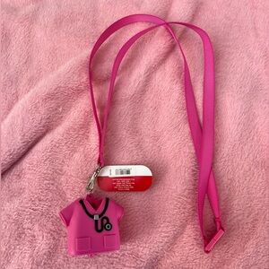 Badge clip/hand sanitizer holder